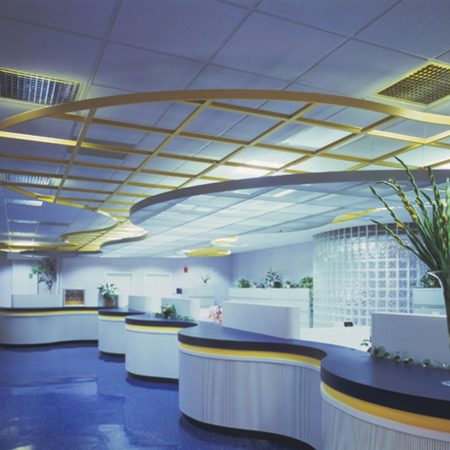Photo of Ceiling System with Curved Edge Trim called Compasso.